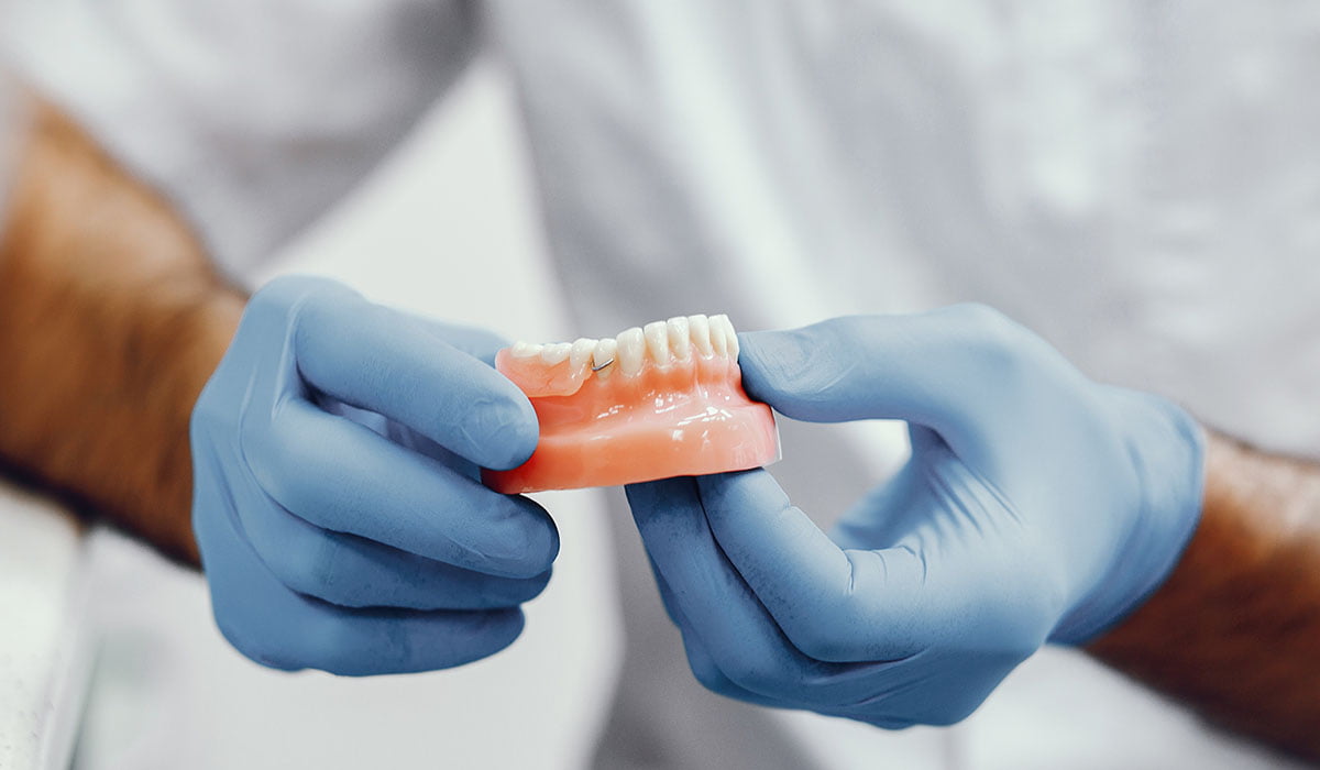 Full Mouth Reconstruction: Dental Implants VS Dentures